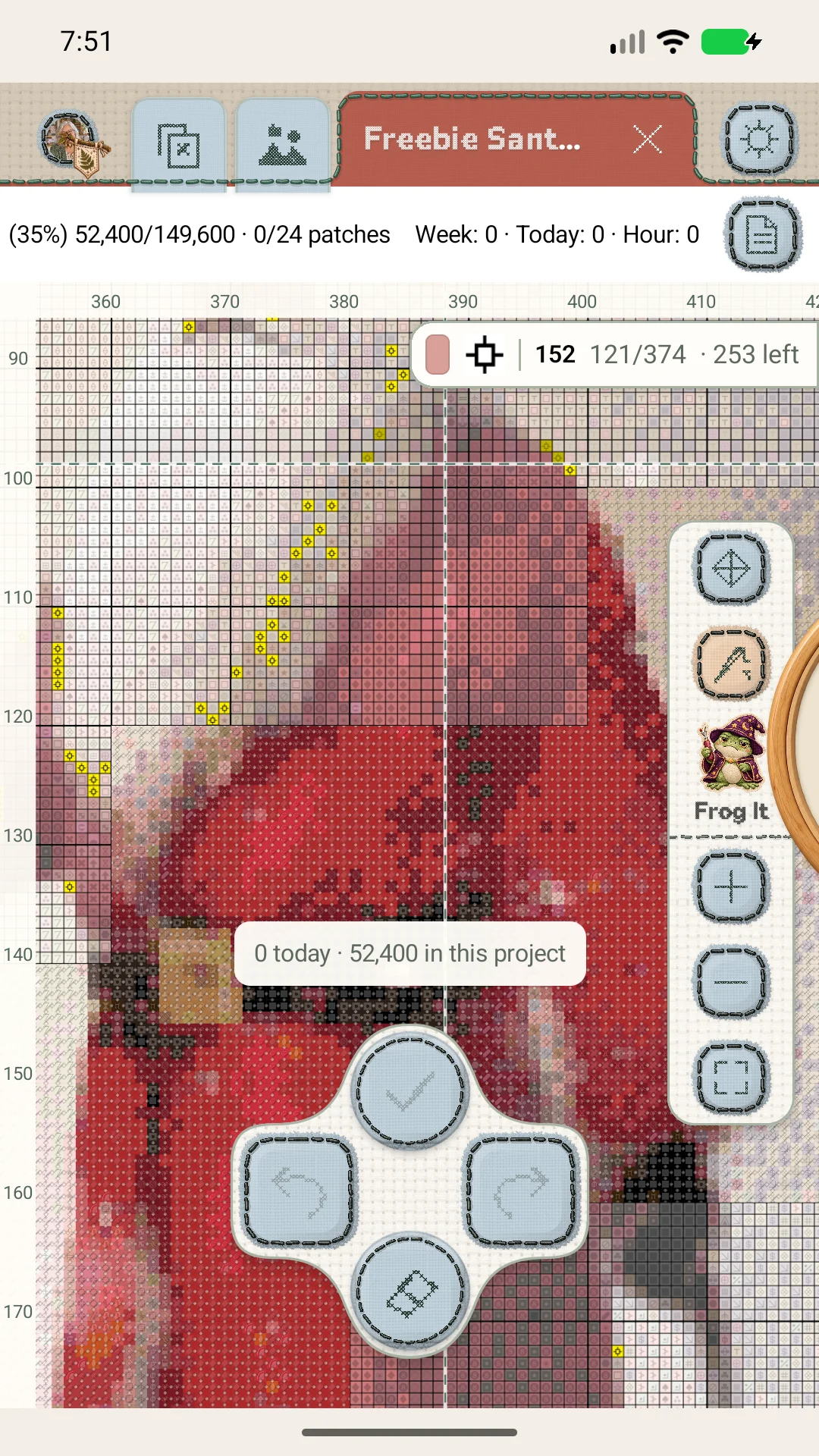 Marking stitches in the colorful Santa chart
