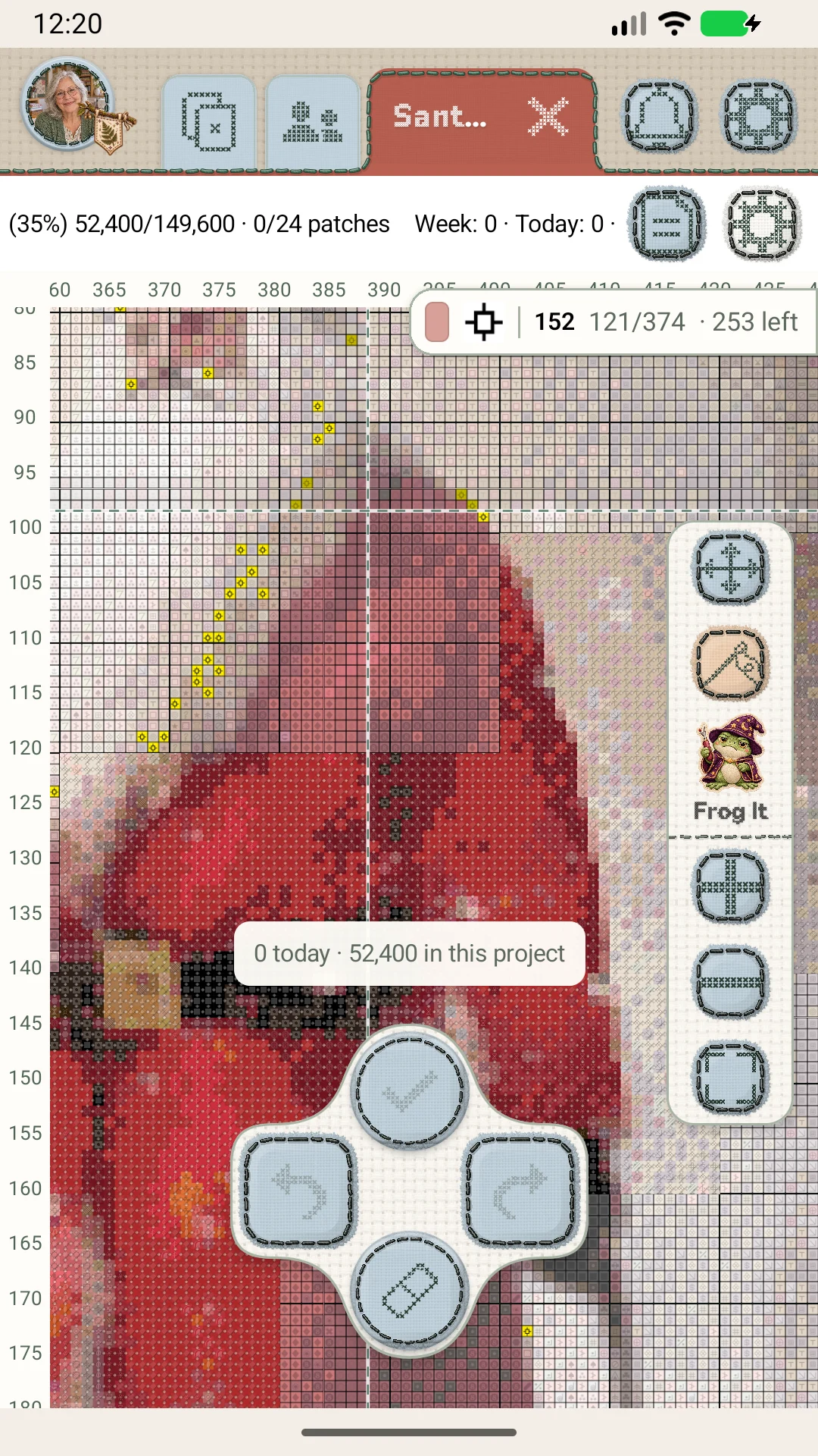 Marking stitches in the colorful Santa chart