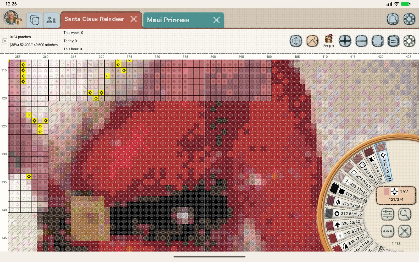 The thread hoop beside the Santa stitching chart